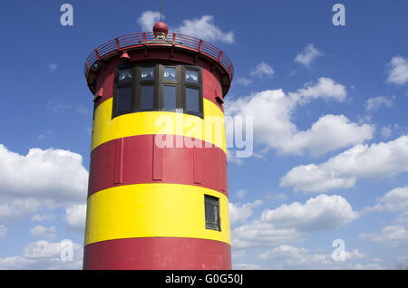 Pilsum Lighthouse, sky and clouds Stock Photo