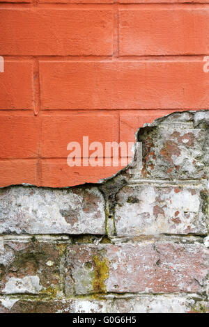 red broken brick wall close up Stock Photo