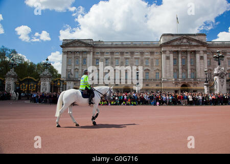 LONDON - MAY 17: British Royal guards riding on horse and perform the Changing of the Guard in Buckingham Palace Stock Photo