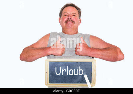 Man with blackboard and labeling holiday. Stock Photo