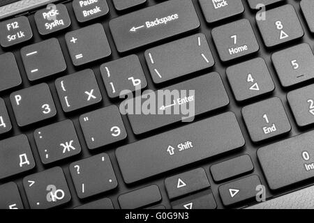 Electronic collection - close-up laptop keyboard with russian letter and key enter Stock Photo