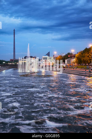 Night view of the Historical park with light and music fountain on the channel dam in Yekaterinburg. Stock Photo