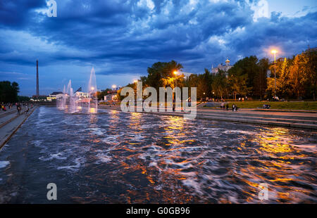 Night view of the Historical park with light and music fountain on the channel dam in Yekaterinburg. Stock Photo