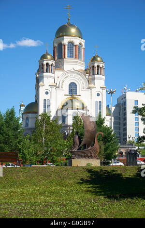 Blooming park in Yekaterinburg, with views of the Church on Blood in Honor of All Saints Resplendent in the Russian Land. monume Stock Photo