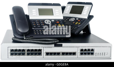 Phone switch system and digital telephones isolated on white Stock ...