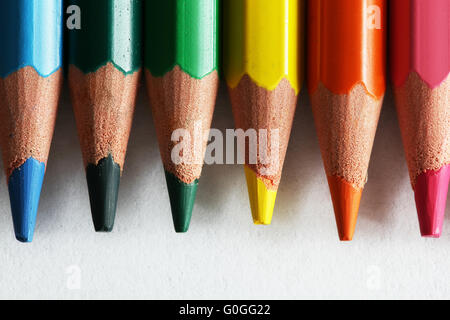 Close-up of colorful pencils arranged as a color pallete and isolated on white. Concepts of creativity Stock Photo