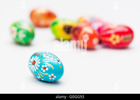 Handmade Easter eggs isolated on white. Floral Stock Photo