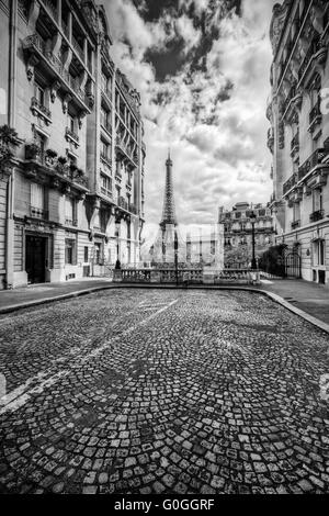 Eiffel Tower seen from the street in Paris, France. Black and white Stock Photo