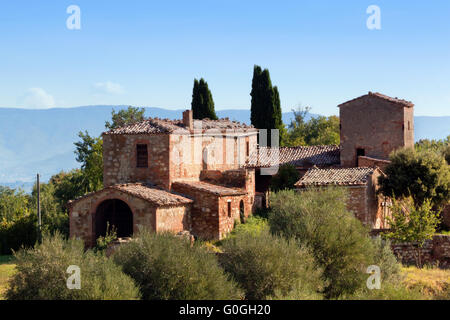 A residence in Tuscany, Italy. Tuscan farm house, cypress trees Stock Photo