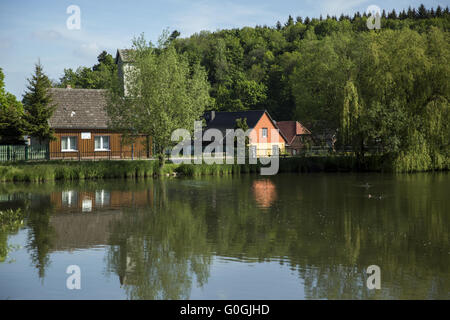 Houses on the lower pond in Stiege, Harz, Saxony-Anhalt, Germany, Europe Stock Photo