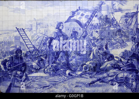 Battle scene made from blue tiles at railway station of Porto Stock Photo