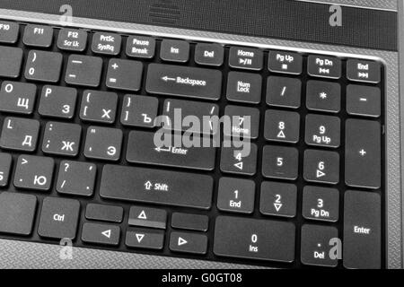 Electronic collection - close-up laptop keyboard with russian letter and key enter Stock Photo