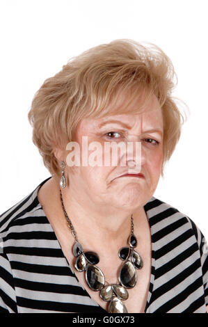 Angry older woman in portrait. Stock Photo