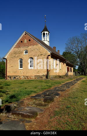 Bethabara, North Carolina:  1788 Gemeinhaus Moravian Church with attached minister's house at Bethabara historic settlement Stock Photo