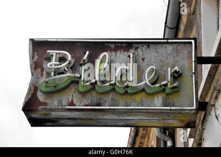 old dilapidated neon sign with the word images in the old town of Brandenburg Stock Photo