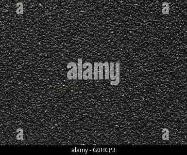 Black sandpaper texture macro shot background Stock Photo