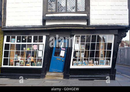 Old King's School shop with crooked blue door Stock Photo
