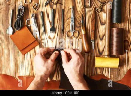 Man working with leather Stock Photo