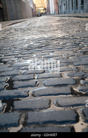 Original Cobblestone streets outside the Guinness Storehouse brewery in Dublin Ireland Stock Photo