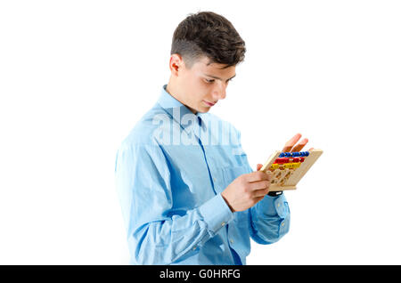 Teenager count on abacus toy isolated on white Stock Photo