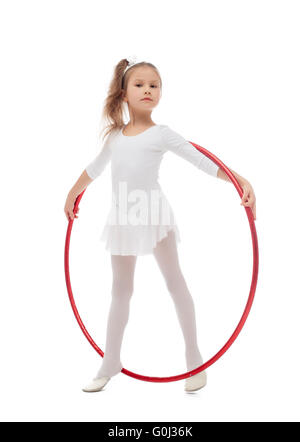 Image of cute young athlete on art gymnastics Stock Photo