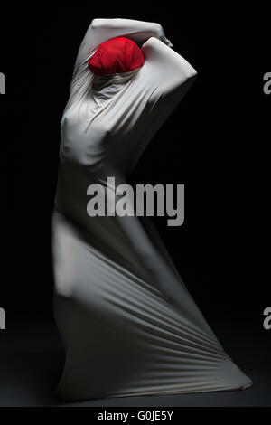 Idea of self-torture - faceless female silhouette Stock Photo