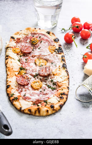 freshly prepared pizza with fresh ingredients Stock Photo