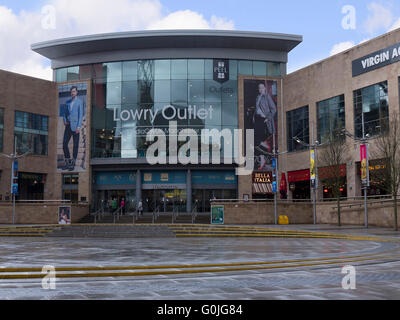The Lowry Shopping outlet on Salford Quays with the metrolink trams was once Manchester's Docks. Stock Photo