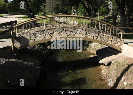 Stone work foot bridge over San Felipe Creek in Del Rio, Texas, USASan Stock Photo