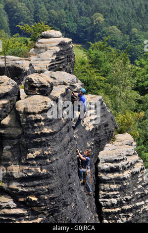 Bastei, climber, rock climbers, rock formation, Elbe Sandstone Mountains, Saxon Switzerland National Park, Saxony, Germany / Nationalpark Sachsische Schweiz, Nationalpark Sächsische Schweiz Stock Photo