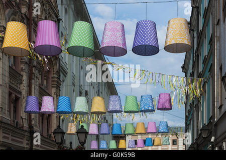 Russia, Moscow Spring Festival continues in the streets and squares of Moscow on May 02, 2016. The festival is associated with a number of Russian holidays: Russian Orthodox Easter and Worker's Day which are to be celebrated on May 1, and Victory Day, May 9. Streets and squares of Moscow are cheerfully decorated for good spirits. Decorative lamp shades over Stoleshnikov lane. Credit:  Alex's Pictures/Alamy Live News Stock Photo