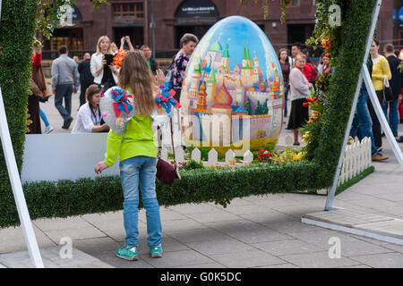 Russia, Moscow Spring Festival continues in the streets and squares of Moscow on May 02, 2016. The festival is associated with a number of Russian holidays: Russian Orthodox Easter and Worker's Day which are to be celebrated on May 1, and Victory Day, May 9. Streets and squares of Moscow are cheerfully decorated for good spirits. Little angel. Unidentified, unrecognizable girl dressed as an angel. Credit:  Alex's Pictures/Alamy Live News Stock Photo