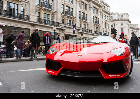 London, UK. 2nd  May 2016. A red Ferrari on display. London's Regent Street is closed to traffic for the annual Gumball 3000, with supercars of the past and present, including Lamborghinis, Porsches and Bugattis, related displays and music entertaining the crowds during the afternoon before participating cars make their way through Picadilly and Mayfair up Regent's Street in the late afternoon. Credit:  Imageplotter News and Sports/Alamy Live News Stock Photo