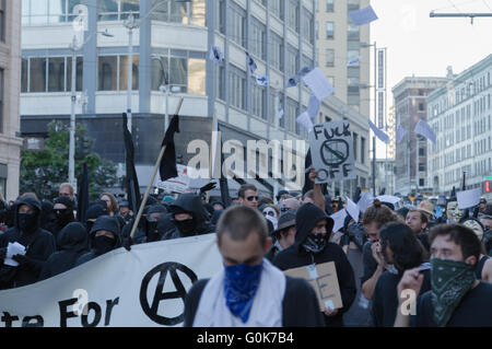 Seattle, WA, USA. 1st May, 2016. Anarchists and Anti-Capitalism/Police force activists march in downtown. Maria S. / Alamy Live News Stock Photo