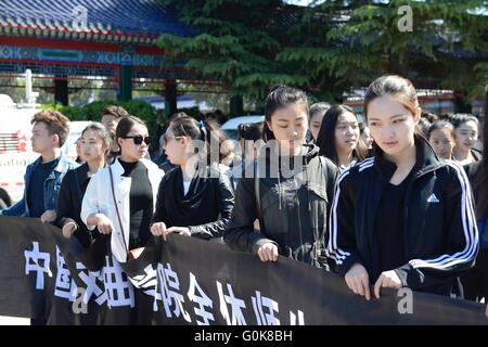 Beijing, China. 3rd May, 2016. Teachers and students from National Academy of Chinese Theatre Arts pay their last respects to Mei Baojiu at Babaoshan Funeral Parlor, Beijing on May 3. Mei Baojiu (29 March 1934 Â¨C 25 April 2016) was a contemporary Peking opera artist, also a performer of the Dan role type in Peking Opera and Kunqu opera, the leader of Mei Lanfang Peking Opera troupe in Beijing Peking Opera Theatre. MeiÂ¡Â¯s father Mei Lanfang was one of the most famous Peking opera performers. Credit:  ZUMA Press, Inc./Alamy Live News Stock Photo