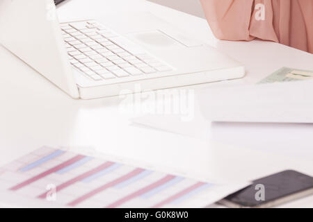 Young Businesswoman Looking at Computer Seriously Stock Photo