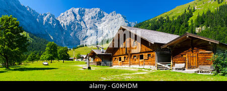 panorama landscape in alps mountains and farm house Stock Photo