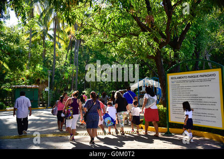 Mexican people walking in Papagayo Park, (Parque Papagayo), Acapulco, Mexico Stock Photo