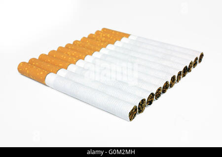 Cigarettes in line isolated on white background Stock Photo