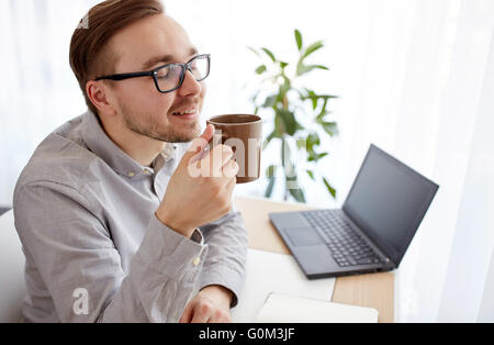 creative man or businessman drinking coffee Stock Photo