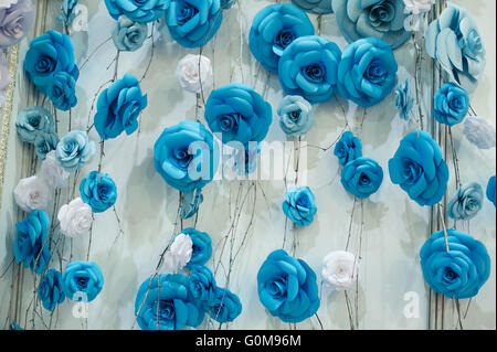 Romantic floral background with blue paper flowers for wedding decor Stock Photo