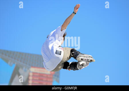 BARCELONA - JUN 28: A professional skater at the Inline skating jumps competition at LKXA Extreme Sports Barcelona Games. Stock Photo