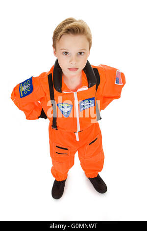 Young Caucasian boy, dressed in an astronaut costume, isolated on white. Stock Photo