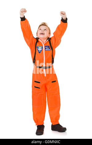 Young Caucasian boy, dressed in an astronaut costume, isolated on white. Stock Photo