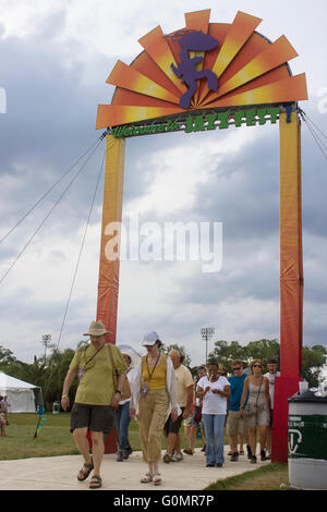 Jazz Fest spectators leaving the Fairgrounds after a day at the N.O. Jazz & Heritage Festival. Stock Photo
