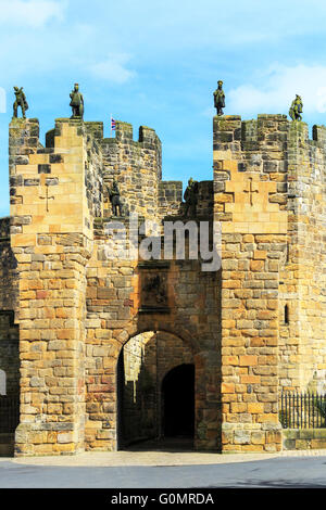 Front portal of Alnwick Castle, Northumberland, England showing statues and turrets. Stock Photo