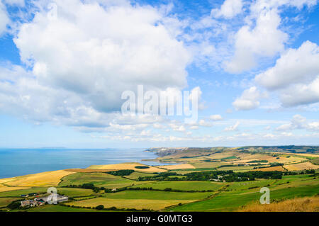 Looking west from Swyre Head on the Isle of Purbeck Dorset with Weymouth and Portland Bill in the distance Stock Photo
