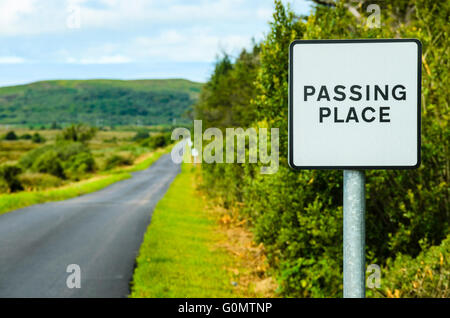 Passing place sign on narrow road on the island of Islay Scotland