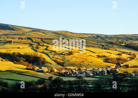 Winter morning looking at the village of Gunnerside in Swaledale in the Yorkshire Dales National Park England Stock Photo