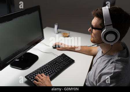 close up of man playing computer video game Stock Photo